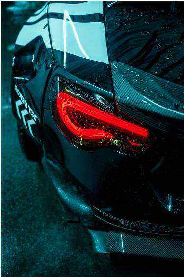 Technician preparing car panel